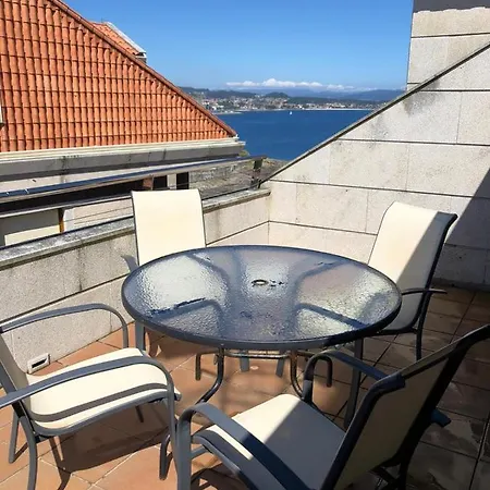 Atico En La Playa De Canelas Con Vistas Y Terrazas Exclusivo Апартаменти